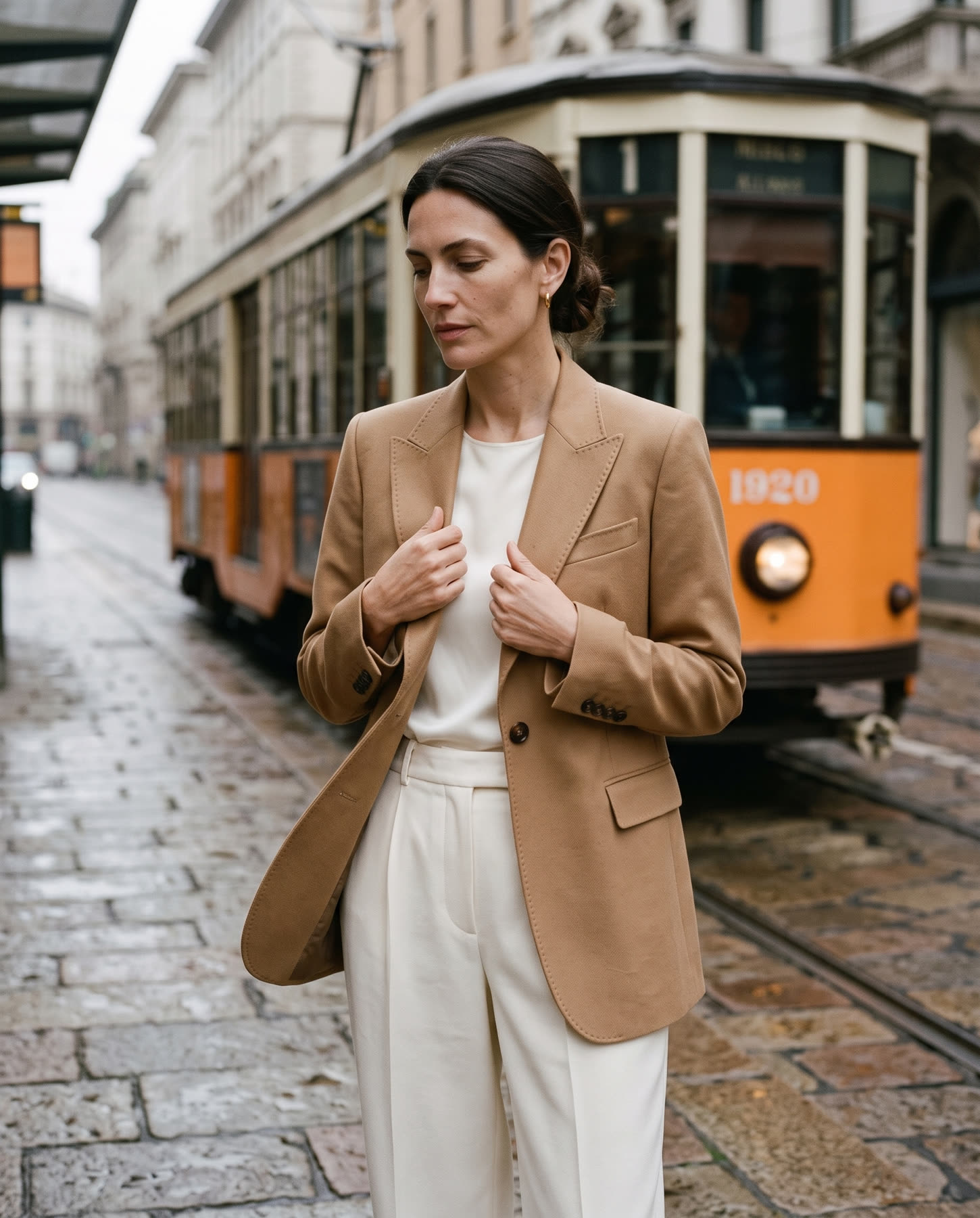 The blazer in front of a Milan tram